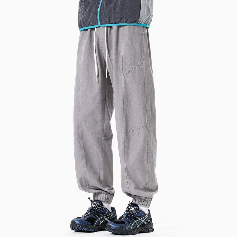 Herren Oversized Utility-Jogginghose aus robustem Baumwollmix mit Kordelbund, seitlichen Cargo‑Taschen & gerippten Bündchen Echoarchiv