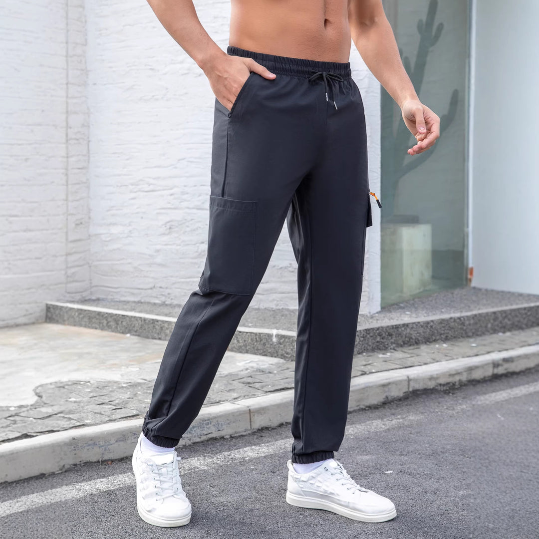Herren Tech-Cargo-Jogginghose mit elastischem Tunnelzug, Reißverschluss‑Beintasche & eng anliegendem Fußbündchen Echo Archiv