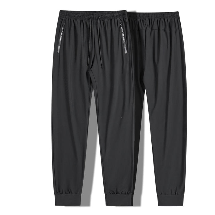 Herren Sportliche Jogginghose mit seitlichen Reißverschlusstaschen Echo Archiv