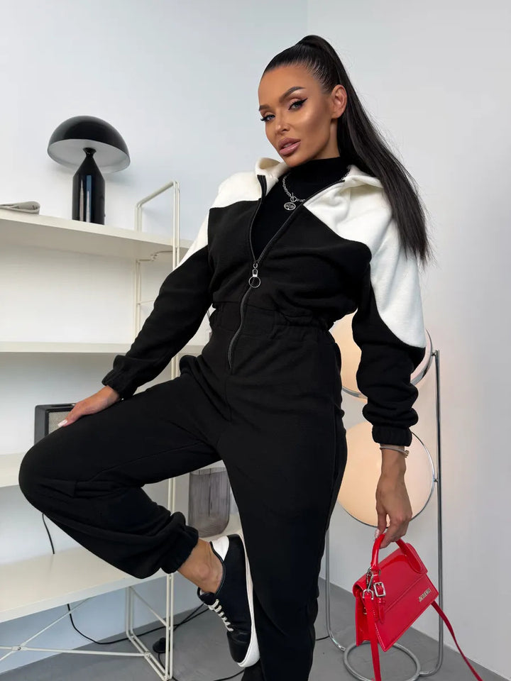 Damen gemütlicher Fleece-Overall mit Kapuze, durchgehendem Reißverschluss und elastischen Bündchen – Élanora