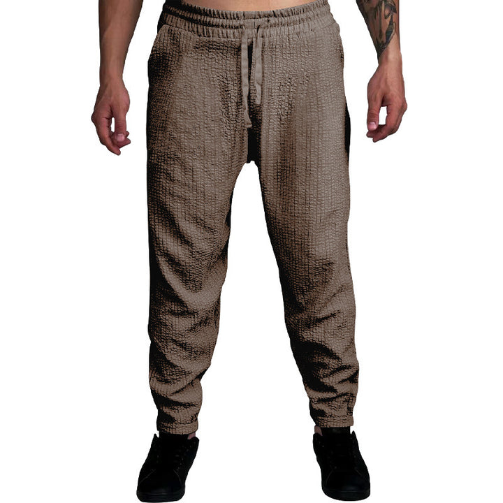 Herren Texturierte tapered Jogginghose mit Elastikbund, Tunnelzug & gerippten Knöchelbündchen – Sorevano