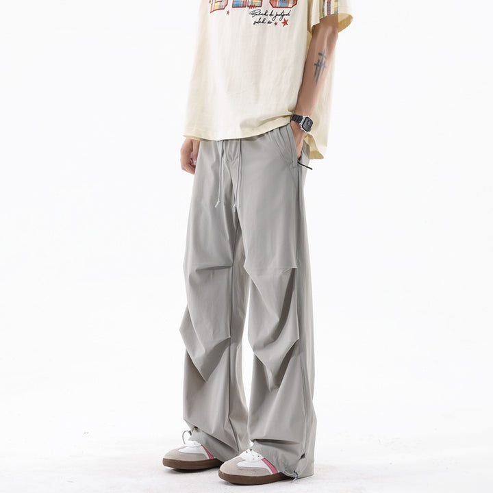 Herren weite Sporthose mit auffälligem Draped-Design Echoarchiv