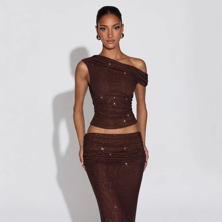 Damen Glänzendes Oberteil mit asymmetrischem Schnitt und glamourösen Strassdetails Echo Archiv