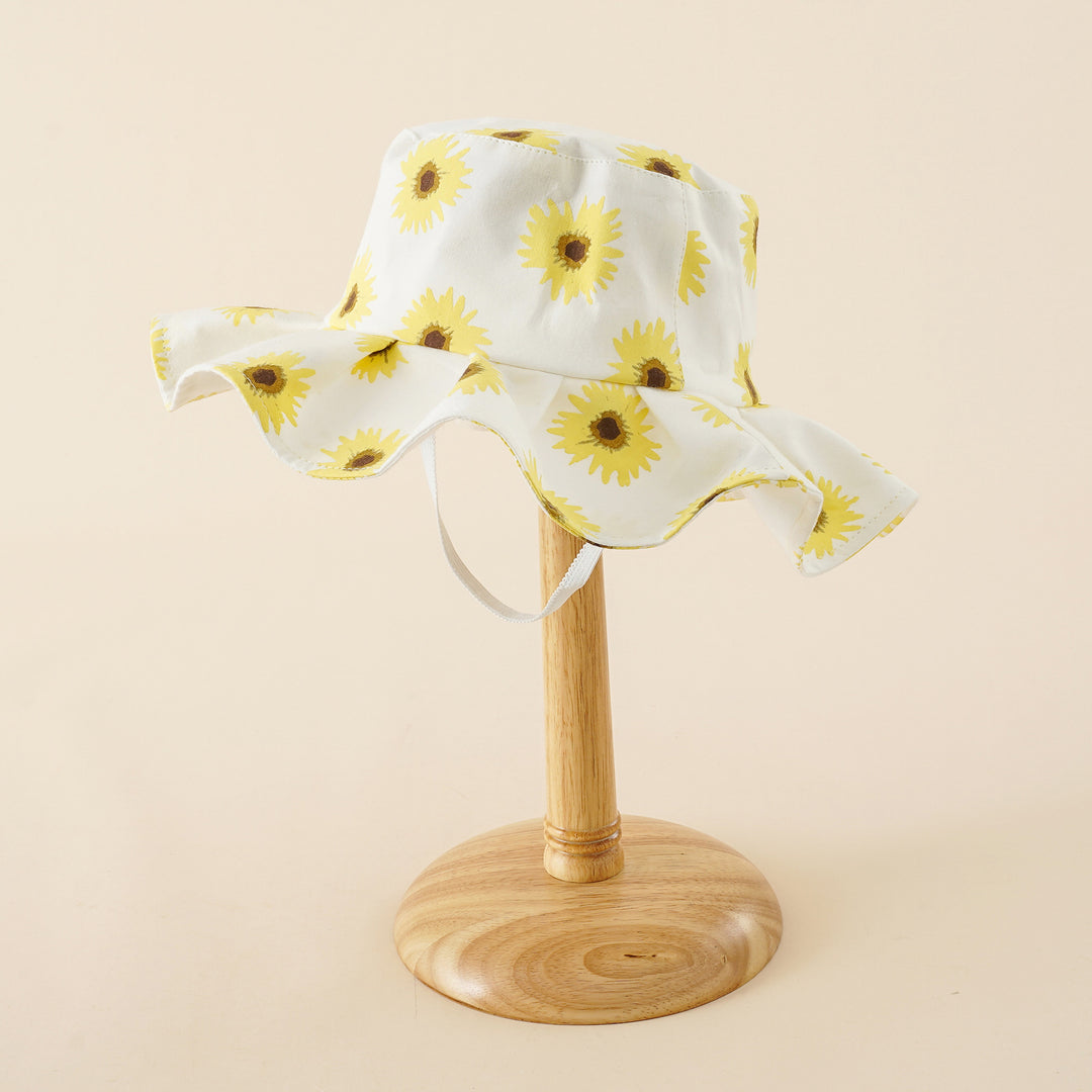 Damen Sonnenhut mit breiter Rüschenkrempe und Sonnenblumen‑Print – Avérine
