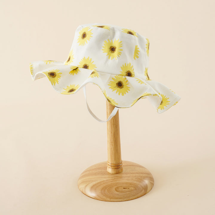 Damen Sonnenhut mit breiter Rüschenkrempe und Sonnenblumen‑Print – Avérine