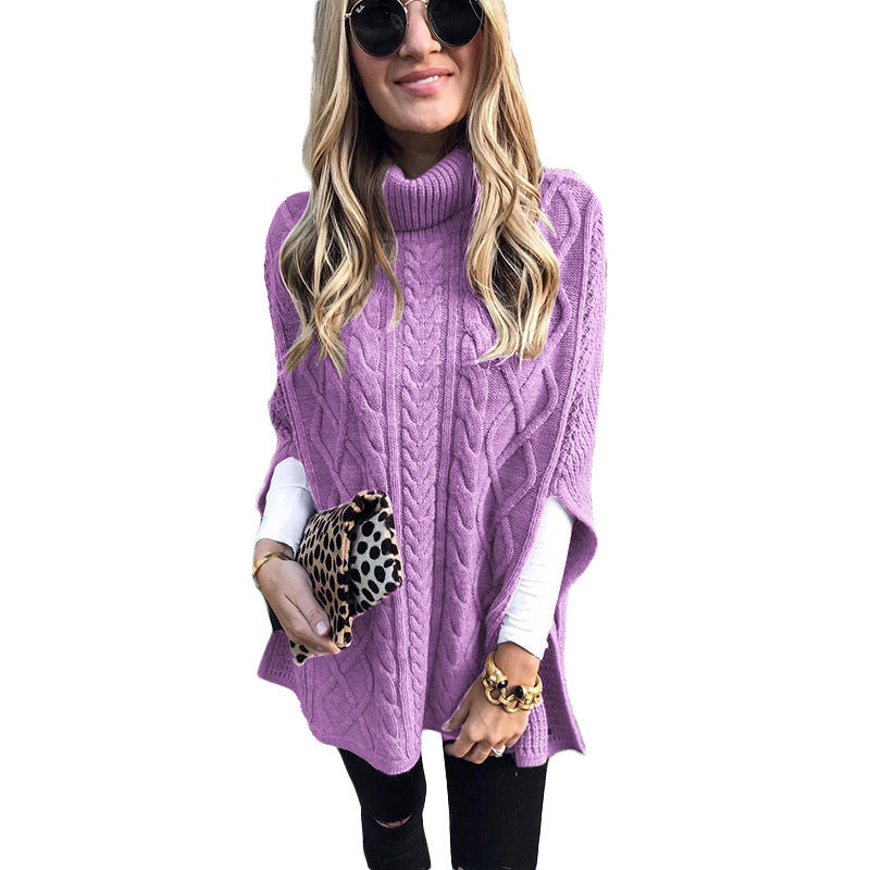 Damen nan kastiger Strickponcho mit hohem Rollkragen, Zopfstruktur und seitlichen Schlitzen Echo Archiv