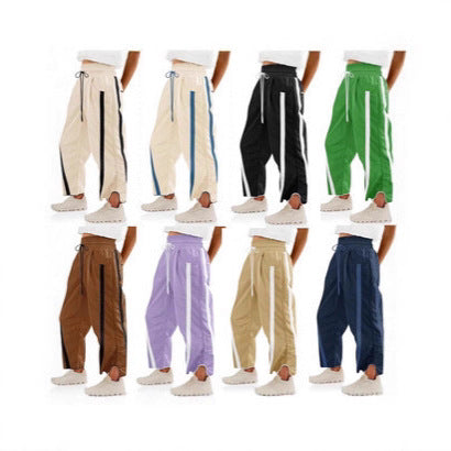 Damen relaxte Trackpants mit seitlichem Kontraststreifen, elastischem Smokbund und Eingrifftaschen – Avélisse