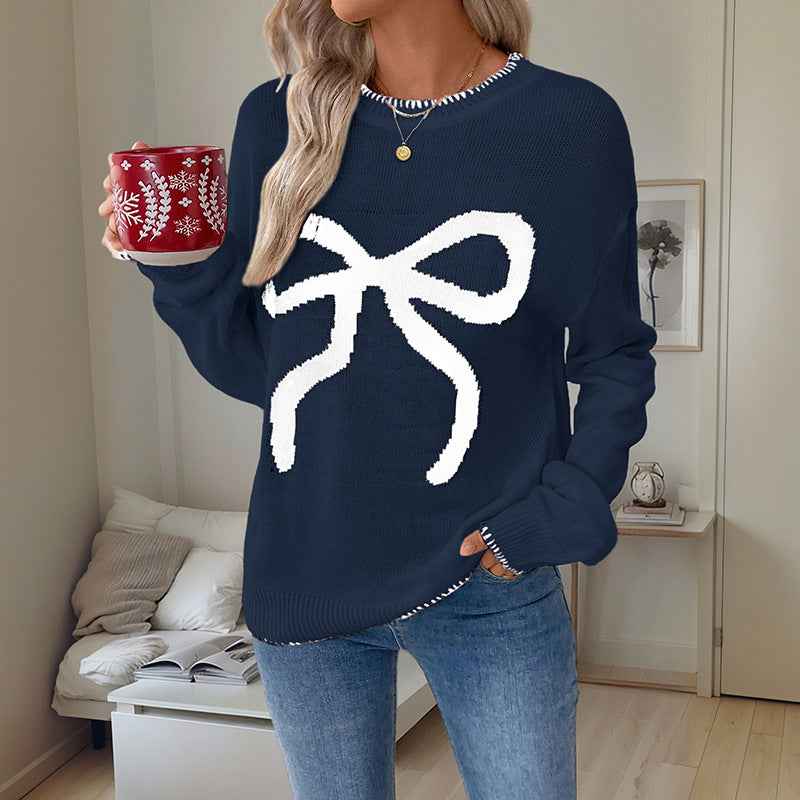 Damen Weihnachtlicher Oversize-Strickpullover mit Schleifenmotiv und gerippten Bündchen Echoarchiv