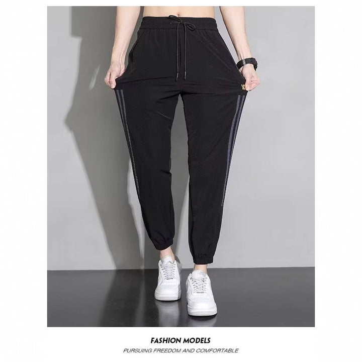 Damen Sportliche Trainingshose mit seitlichen Streifen Echoarchiv