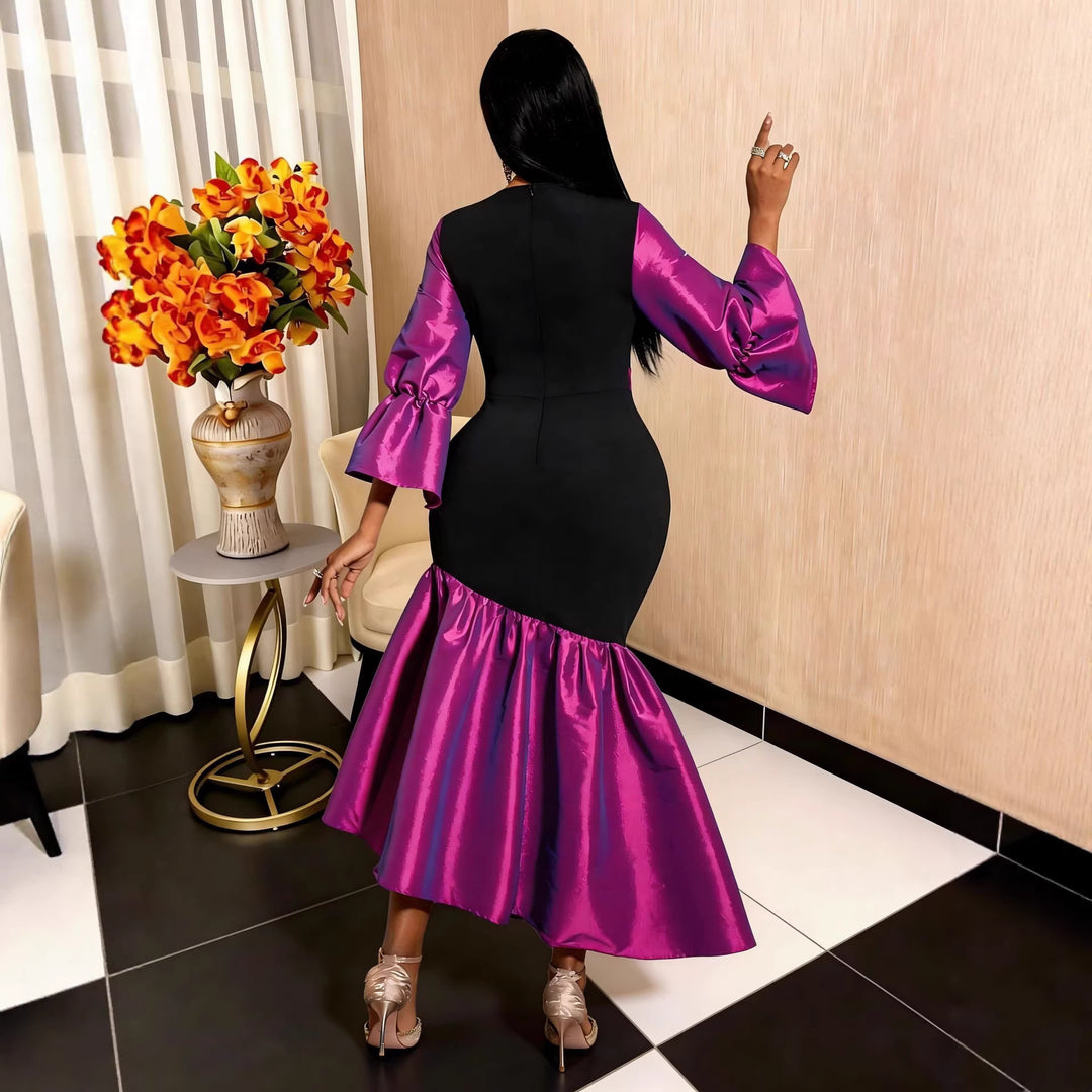 Damen Abendkleid mit voluminösen Ärmeln und elegantem Saum Echo Archiv