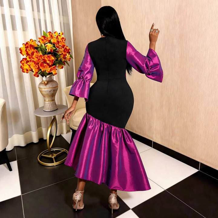 Damen Abendkleid mit voluminösen Ärmeln und elegantem Saum Echo Archiv