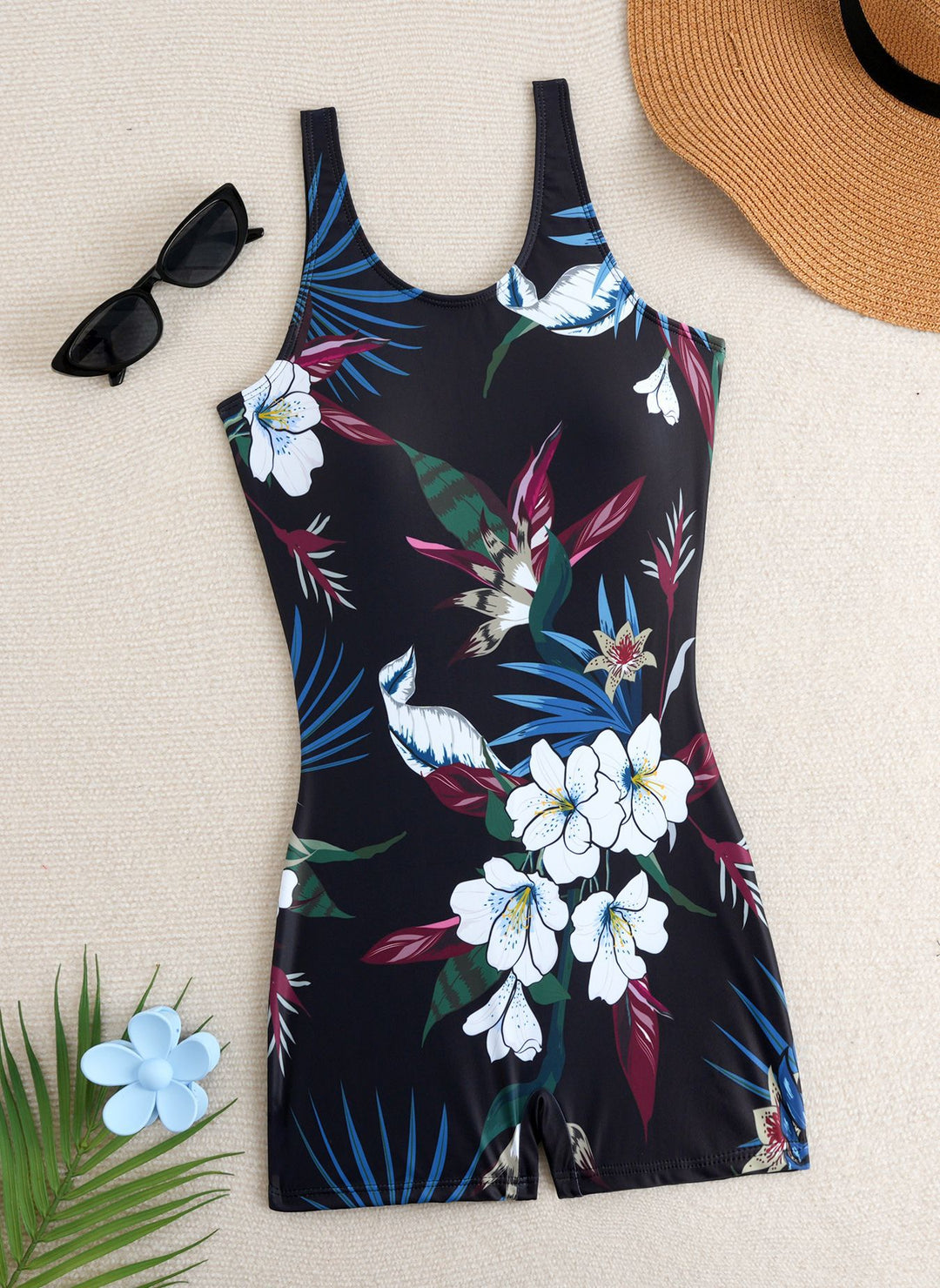 Damen Einteiler Badeanzug mit floralen Mustern und sportlichem Schnitt Echo Archiv