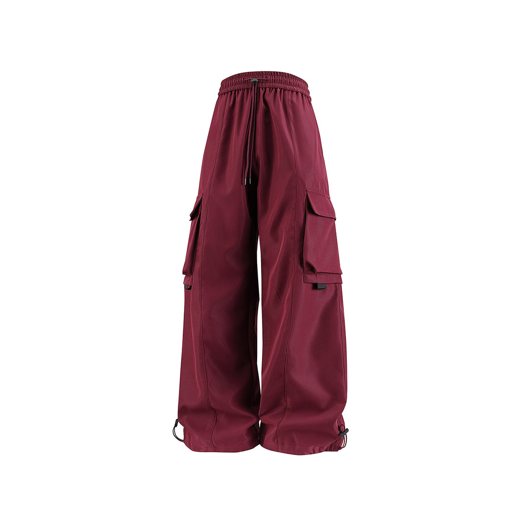 Herren weite Utility‑Cargohose im Baggy‑Cut mit Tunnelzugbund, großen Klappentaschen und verstellbarem Beinabschluss Echo Archiv