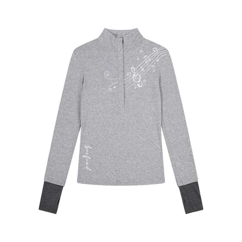 Damen Langarmshirt mit Henley-Knopfleiste, Kontrastbündchen und Notenprint Echoarchiv