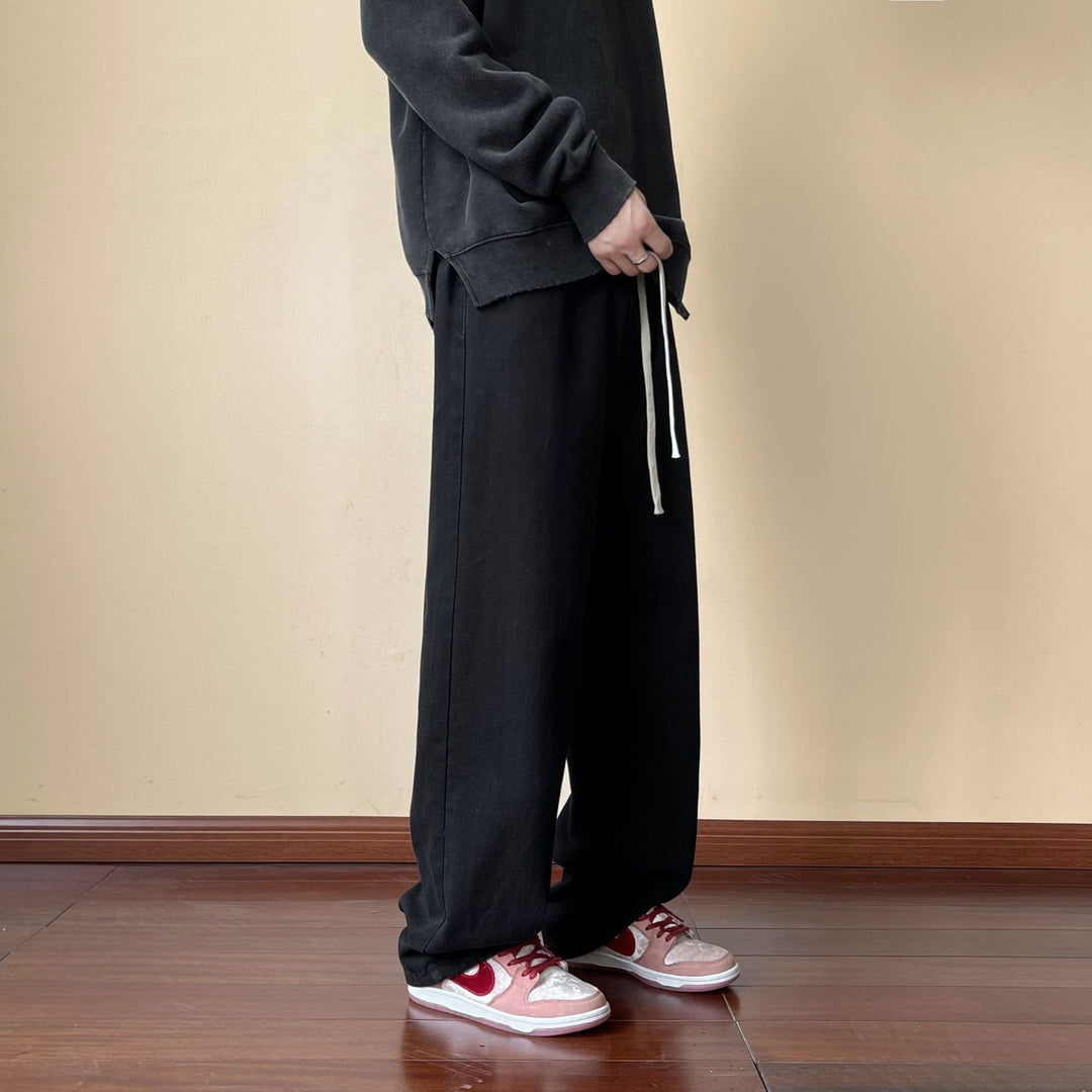 Herren locker sitzende Jeanshose im Oversize-Baggy-Stil mit Tunnelzug Echo Archiv