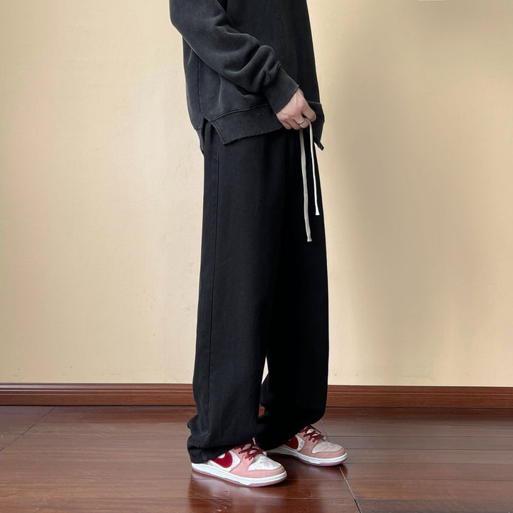 Herren locker sitzende Jeanshose im Oversize-Baggy-Stil mit Tunnelzug Echo Archiv