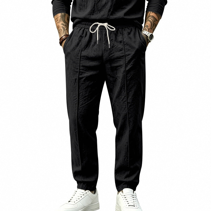 Herren Leichte Tapered-Jogginghose mit Bundfalten, elastischem Tunnelzug und Seitentaschen Echoarchiv