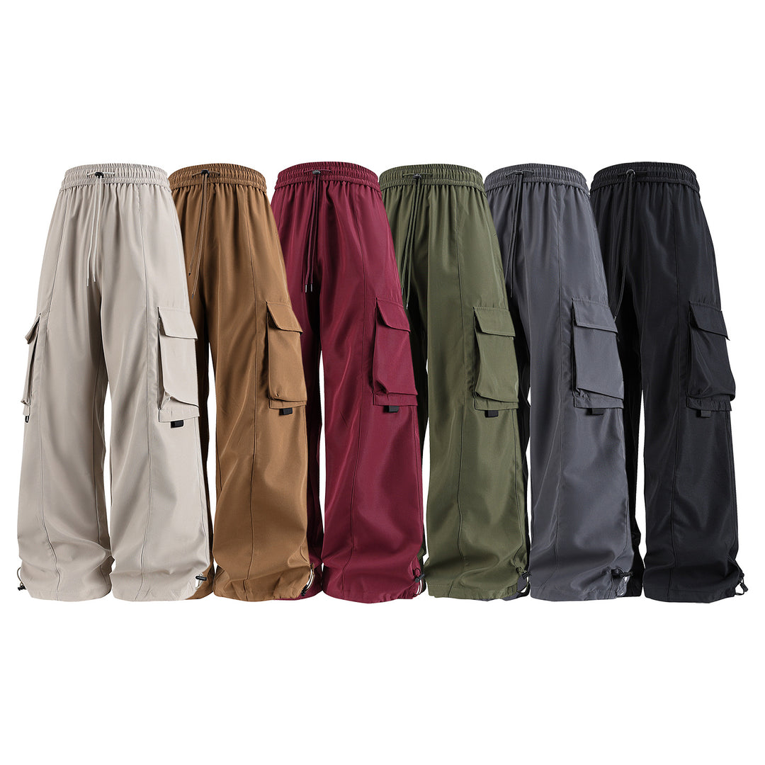 Herren weite Utility‑Cargohose im Baggy‑Cut mit Tunnelzugbund, großen Klappentaschen und verstellbarem Beinabschluss Echo Archiv