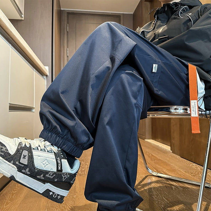 Herren Wasserabweisende Tech-Jogginghose mit elastischem Saum, Kordelzug und robusten Nähten Echo Archiv