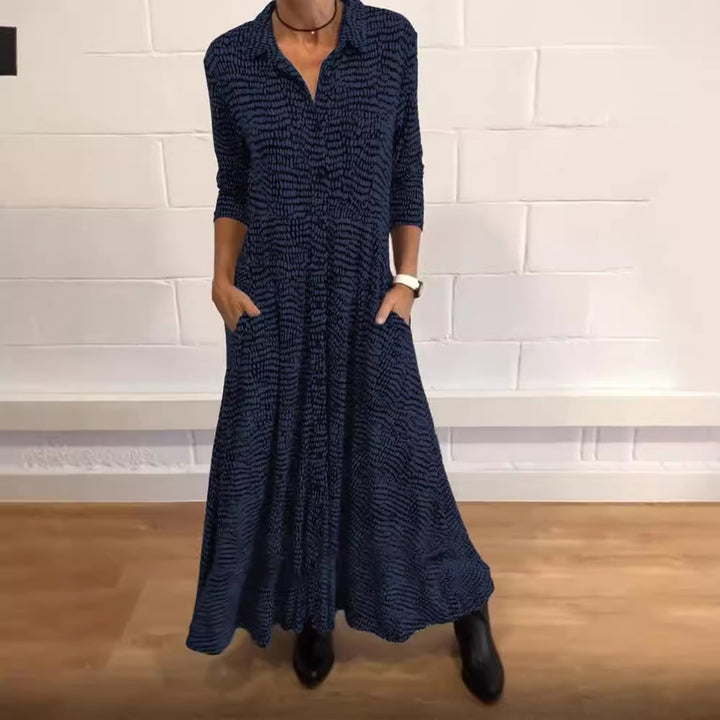 Damen nan fließendes Maxikleid mit Hemdblusenkragen, V-Ausschnitt, dreiviertelärmeln und Seitentaschen Echo Archiv