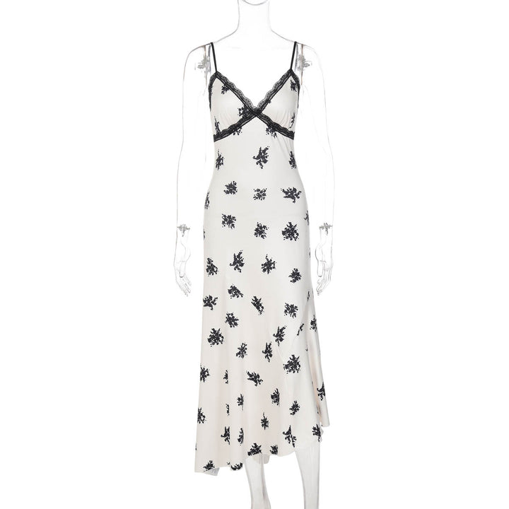 Damen Elegantes Maxikleid mit floralem Relief und feinen Spaghettiträgern Echo Archiv