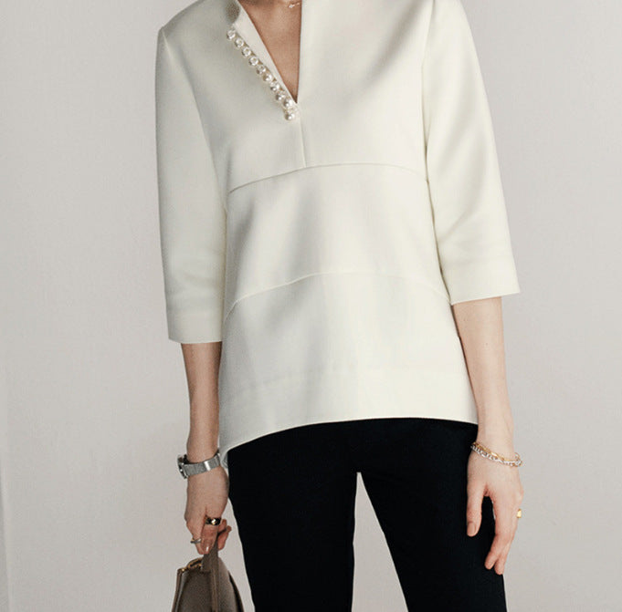 Damen Elegante Bluse mit Perlendetails Echoarchiv