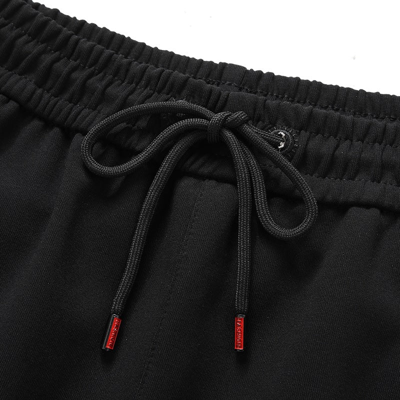 Herren Sportliche konisch zulaufende Jogginghose mit Elastbund, Kordelzug & Reißverschlusstaschen Echoarchiv