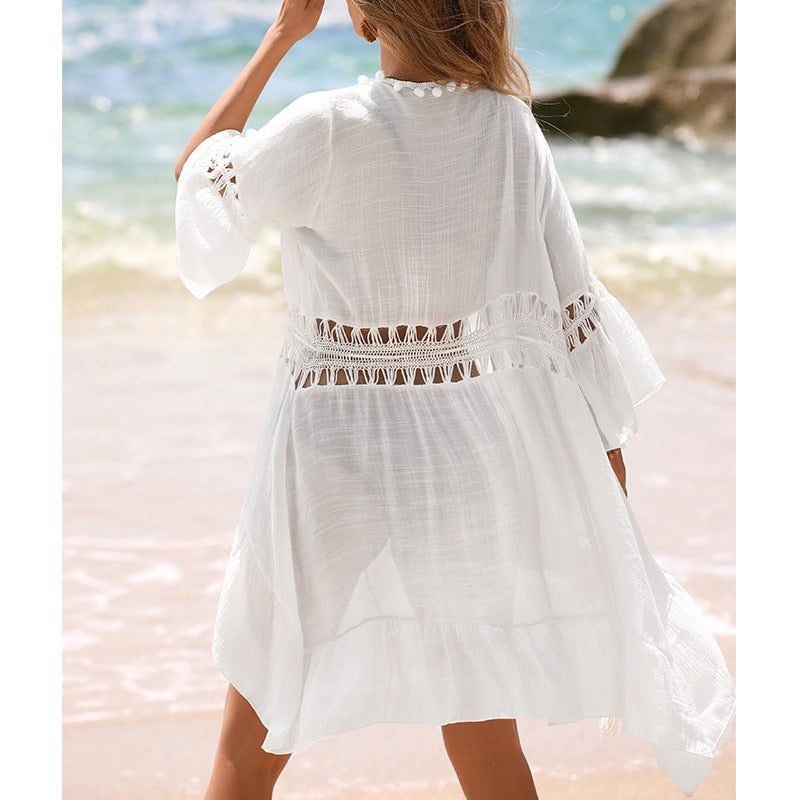 Damen Strandkleid mit offener Front und dekorativen Häkelelementen Echoarchiv