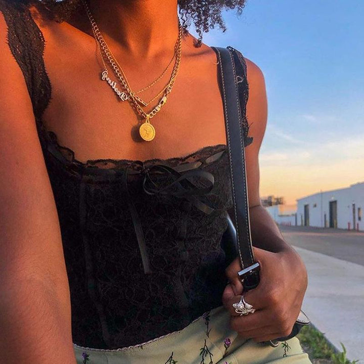 Damen Spitzen-Crop-Top mit dekorativen Bändern und feinen Details Echo Archiv