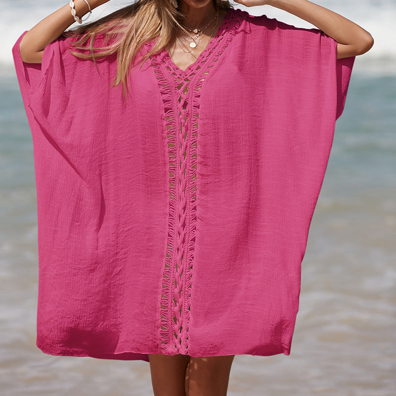 Damen eleganter Strandponcho mit raffinierten Häkelakzenten und tiefem V-Ausschnitt Echo Archiv