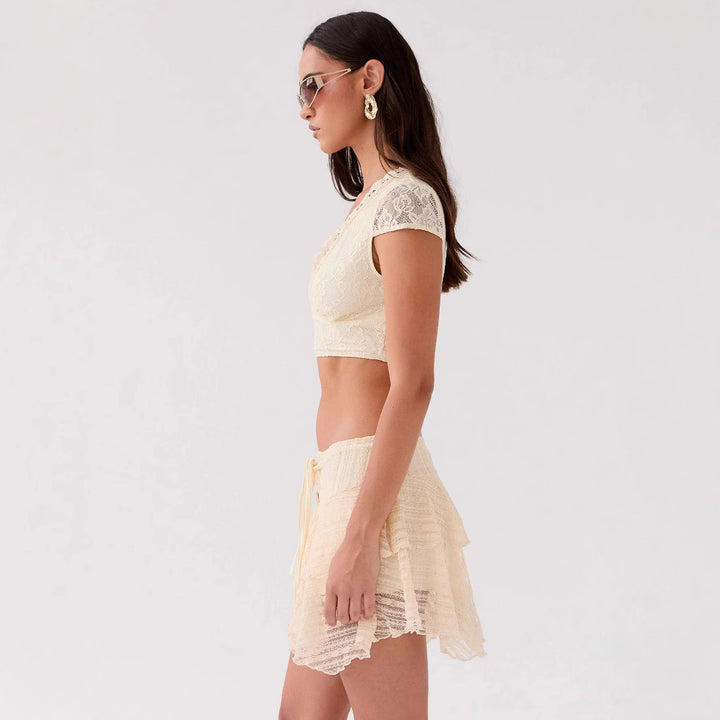 Damen Crop-Top mit raffiniertem Spitzenbesatz und verspieltem Minirock Echo Archiv