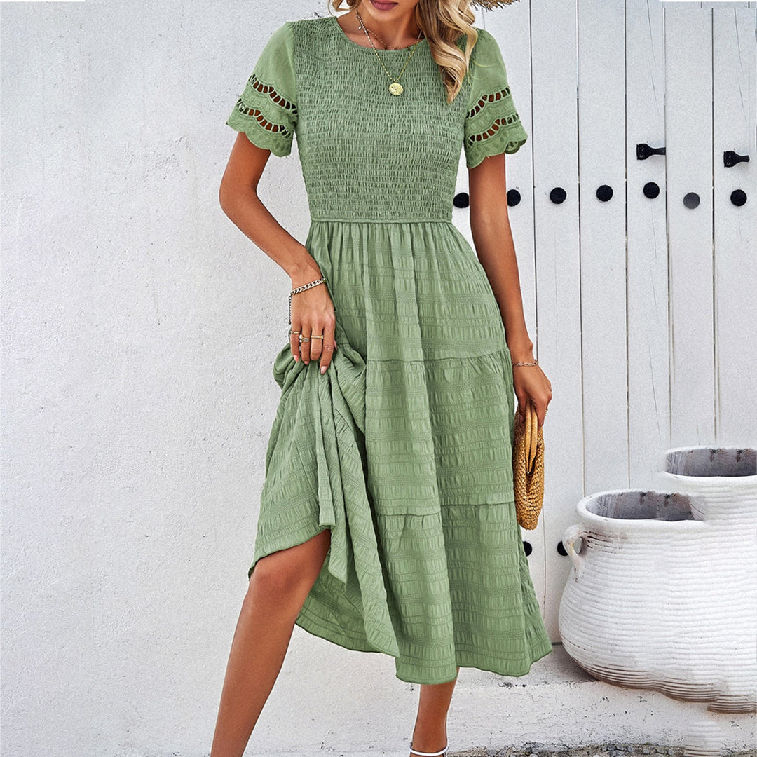 Damen Midikleid mit Puffärmeln und Elastischem Oberteil Echoarchiv