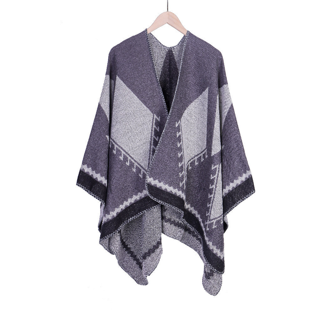 Damen Grobgestrickte Oversize-Ruana mit grafischem Blockmuster und asymmetrischem Zipfelrand Echo Archiv