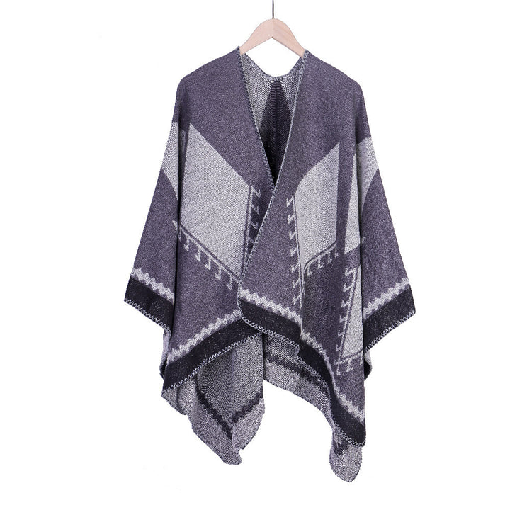 Damen Grobgestrickte Oversize-Ruana mit grafischem Blockmuster und asymmetrischem Zipfelrand Echo Archiv