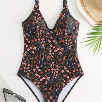 Damen eleganter und figurbetonter Badeanzug mit floralem Design Echo Archiv