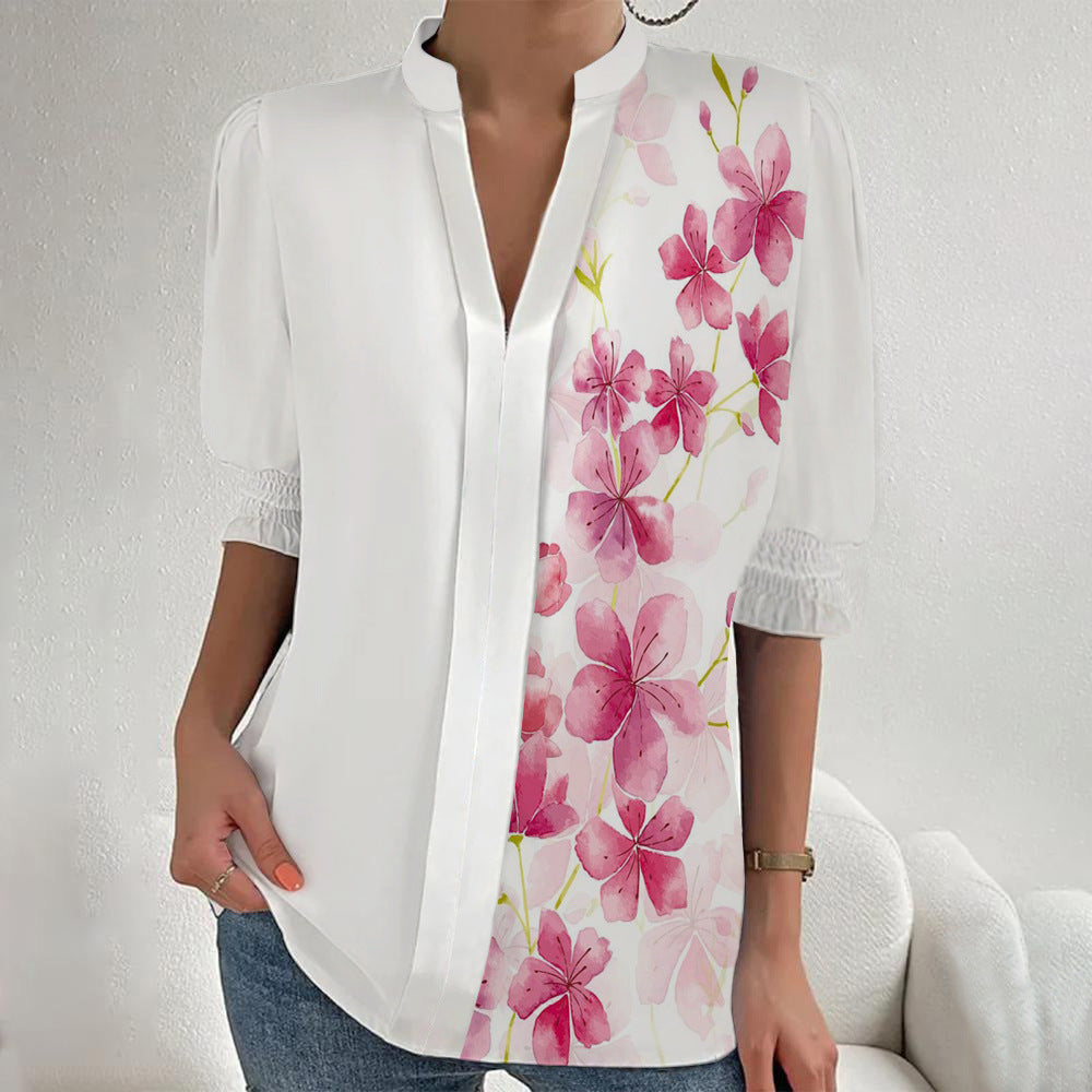 Damen Blumenprint Tunika-Bluse mit Stehkragen, geschlitzter V‑Blende und gerafften 3/4-Ärmeln – Élovi