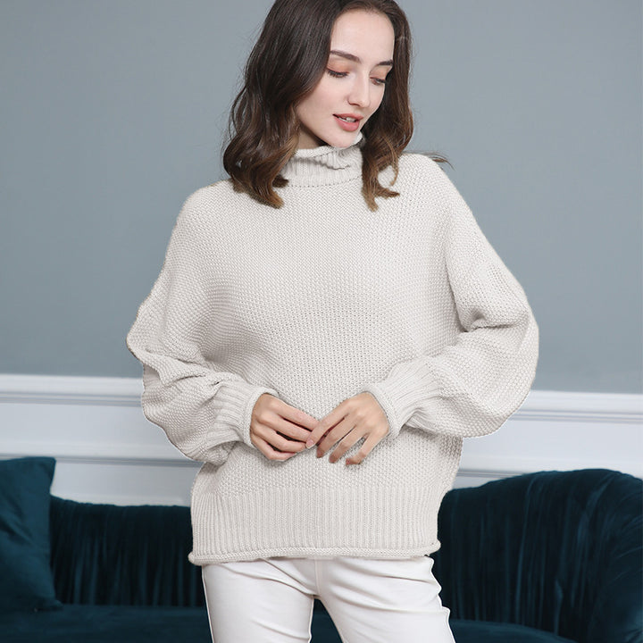 Damen Grobgestrickter Rollkragenpullover mit Ballonärmeln Echo Archiv