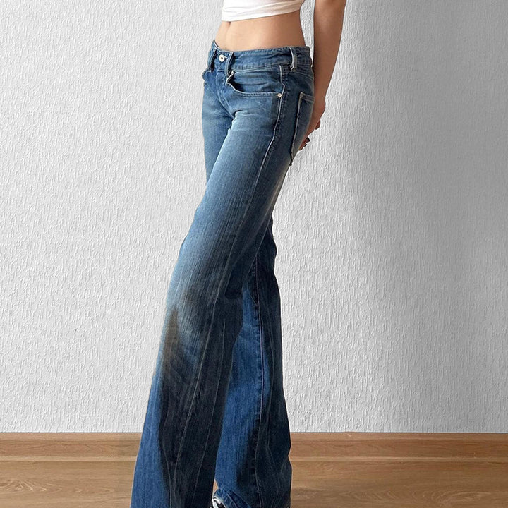 Damen hochtaillierte Schlagjeans mit dezenter Used-Waschung und ausgestelltem Bein – Dénora