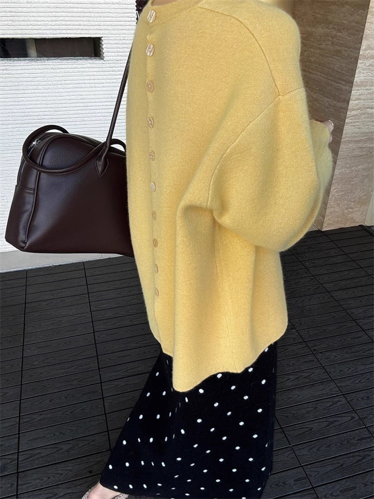 Damen Oversize-Feinstrickpullover mit Ballonärmeln und Knopfmanschette Echoarchiv