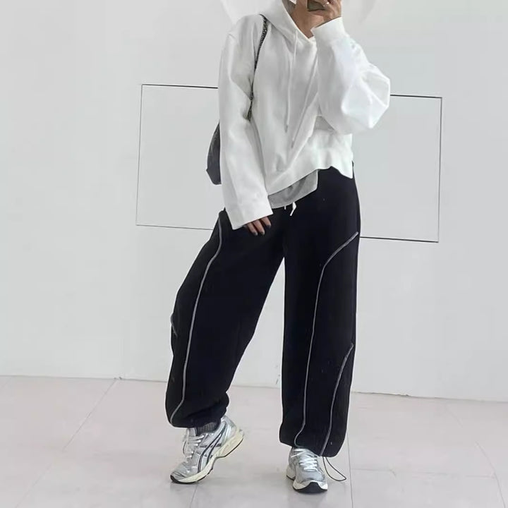 Damen Weite Sweatpants mit kontrastierenden Nahtdetails und Kordelzug – Avérine