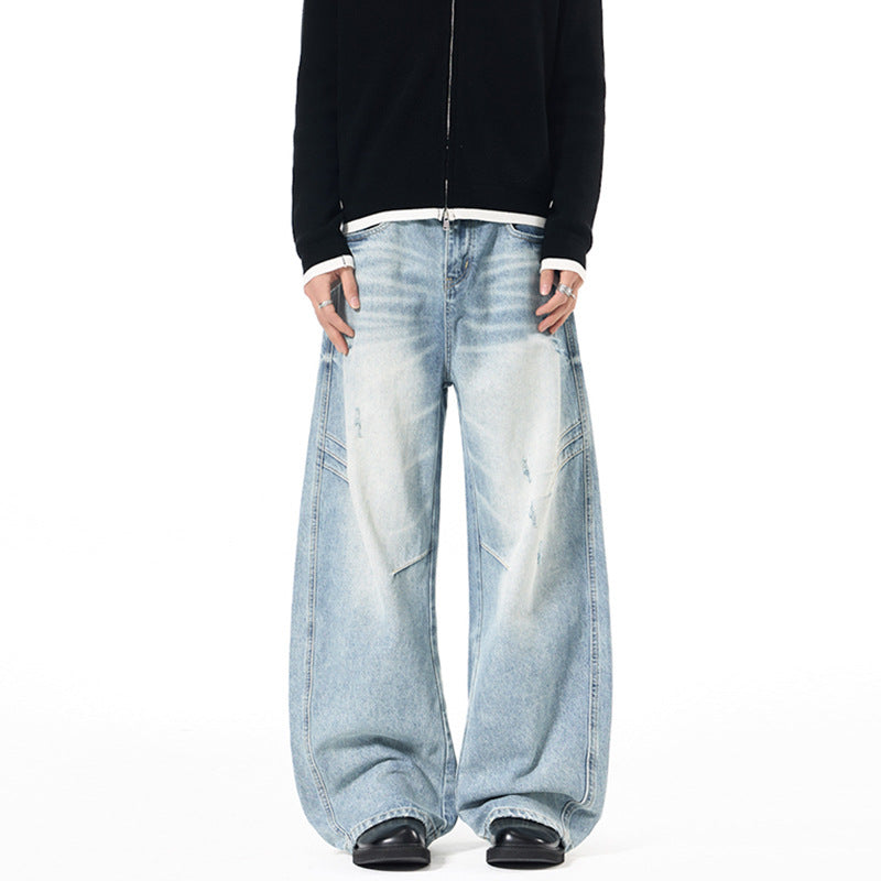 Herren Ultraweite Denim-Palazzohose mit skulpturalen Seitenbahnen und Used‑Effekt Echo Archiv