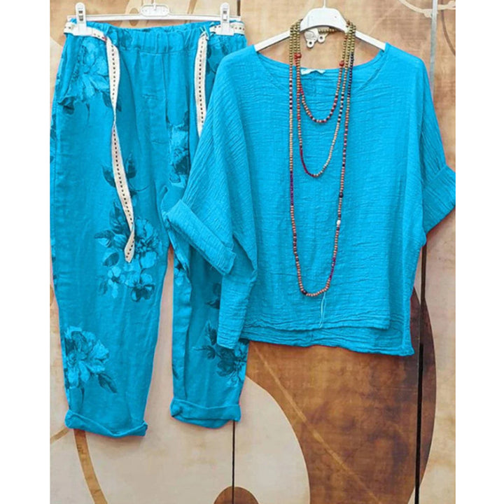 Damen nan leichtes Crinkle-Zweiteiler-Set mit lockerem U-Boot-Top und floral bedruckter Joggerhose Echo Archiv