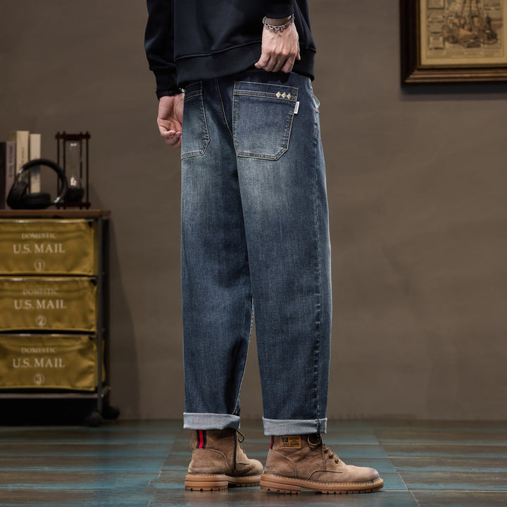 Herren Weite gerade geschnittene Denim-Jeans mit Used‑Wash und Umschlagbund Echoarchiv