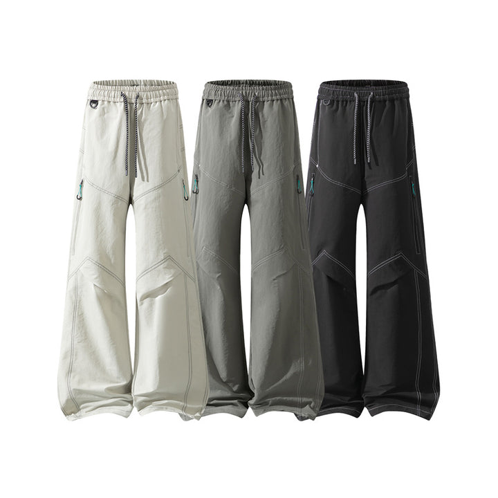 Herren Weite Cargo‑Hose mit Tunnelzugbund, Utility‑Nähten und Reißverschluss‑Taschen Echo Archiv