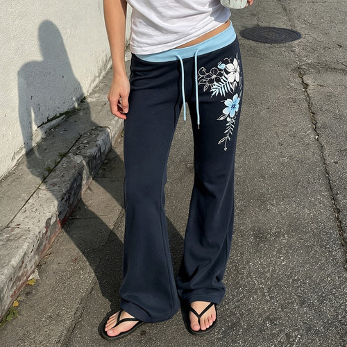 Damen Ausgestellte Lounge-Hose mit Rippbund, Kordelzug und floralem Print – Avélisse