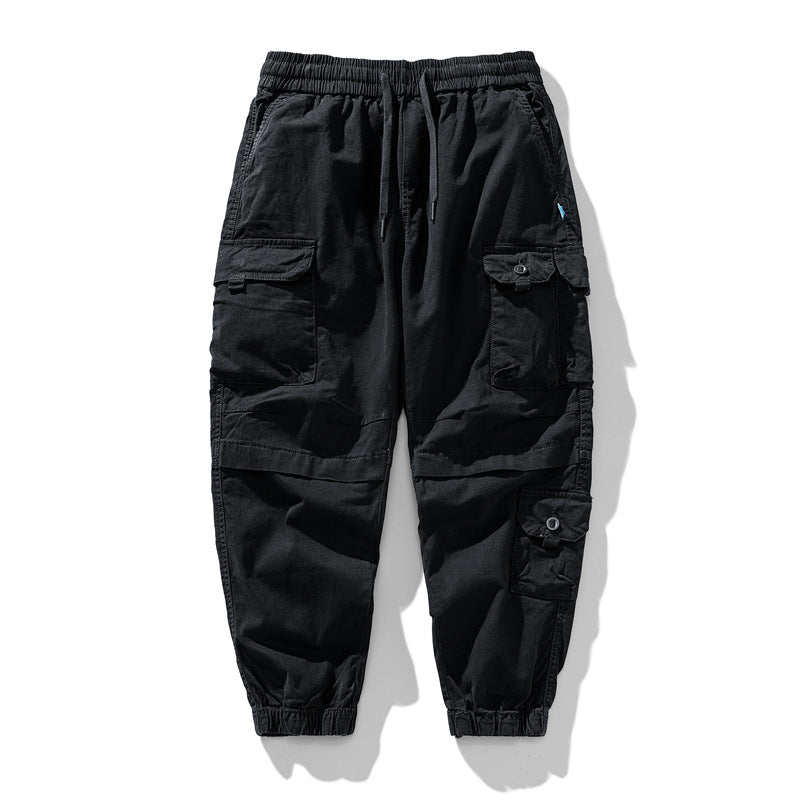 Herren Leichte Canvas-Cargohose im Joggerstil mit elastischem Bund, segmentierten Kniepaneelen und verdeckten Klappentaschen Echo Archiv
