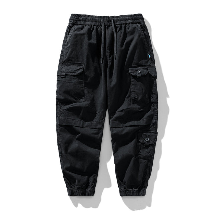Herren Leichte Canvas-Cargohose im Joggerstil mit elastischem Bund, segmentierten Kniepaneelen und verdeckten Klappentaschen Echo Archiv