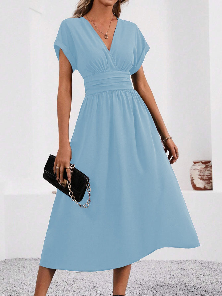 Echoarchiv | Elegante Wickelkleid