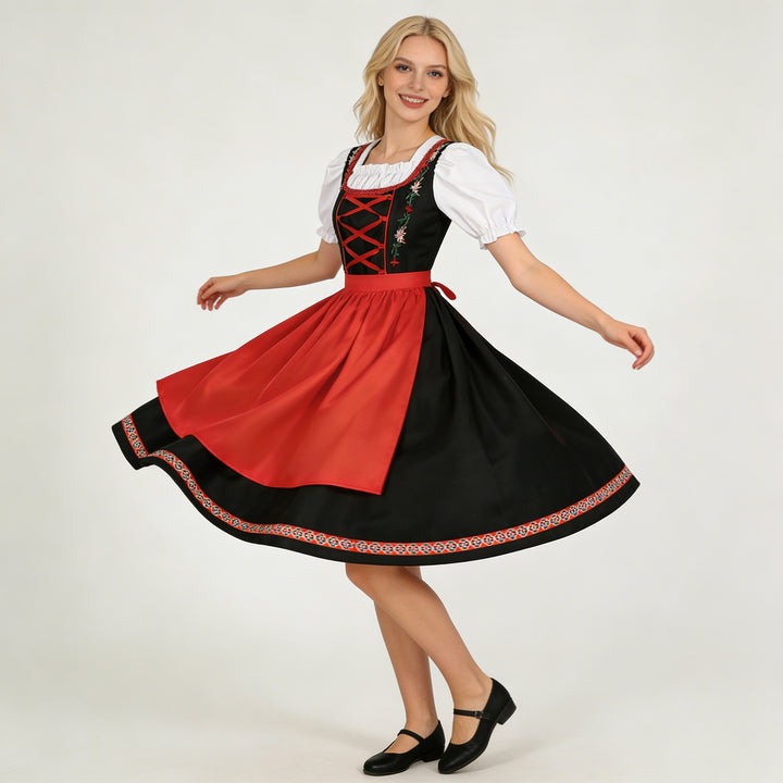 Damen nan traditionelles Dirndlkleid mit besticktem Mieder, Puffärmeln und Schürze Echo Archiv