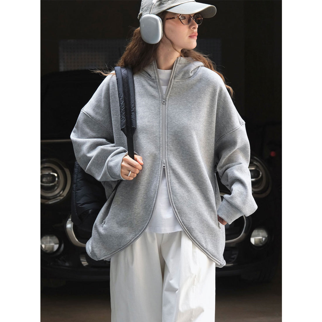 Damen Oversized Kapuzen-Sweatjacke mit geschwungenem Saum Echoarchiv